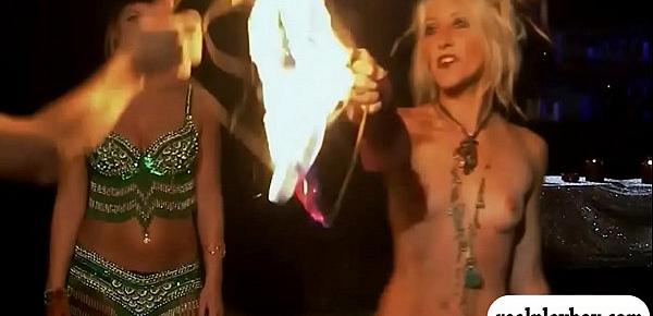  Sexy babes fire dancing and give massage